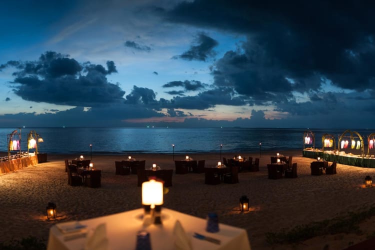Dining on the beach by night